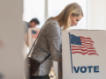 Woman at voting booth